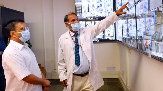 Delhi chief minister Arvind Kejriwal during his visit to a hospital to review the preparedness for Covid-19 management, in New Delhi on Saturday.(HT Photo)