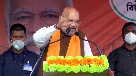 Union home minister Amit Shah addresses during an election campaign ahead of the fifth phase of the West Bengal Assembly election, at Basirhat in North 24 Paraganas on Sunday. (ANI Photo)