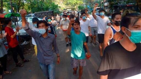 People march to protest against the military coup in February, in Yangon, Myanmar, Sunday, April 11, 2021.(AP) People march to protest against the military coup in February, in Yangon, Myanmar, Sunday, April 11, 2021.(AP)