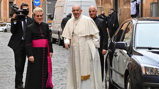The service was held in a church just off St Peter's Square, in front of a reduced congregation of about 80 people, due to coronavirus restrictions. (AFP) The service was held in a church just off St Peter's Square, in front of a reduced congregation of about 80 people, due to coronavirus restrictions. (AFP)