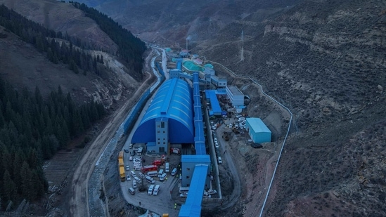 In this aerial photo released by Xinhua News Agency, shows rescue workers at a flooded coal mine in Hutubi county in of Hui Autonomous Prefecture of Changji, northwest China's Xinjiang Uyghur Autonomous Region on Sunday. (AP Photo ) In this aerial photo released by Xinhua News Agency, shows rescue workers at a flooded coal mine in Hutubi county in of Hui Autonomous Prefecture of Changji, northwest China's Xinjiang Uyghur Autonomous Region on Sunday. (AP Photo )