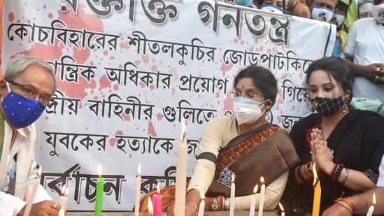 Kolkata: TMC candidate from Shyampukur constituency, Sashi Panja, with her party associates paying candle light tribute who lost their life at a polling booth of Sitalkuchi, where clashes erupted between locals and central forces yesterday, during the ongoing West Bengal Assembly polls. (PTI)