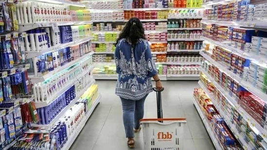 A shopper walks through an aisle displaying personal care goods at a Big Bazaar hypermarket, operated by Future Retail Ltd. in Mumbai (Bloomberg File Photo) A shopper walks through an aisle displaying personal care goods at a Big Bazaar hypermarket, operated by Future Retail Ltd. in Mumbai (Bloomberg File Photo)