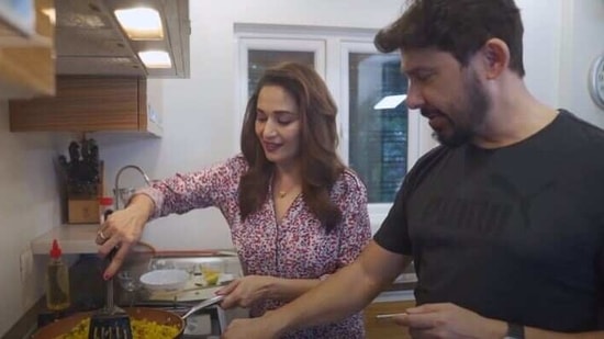 Madhuri Dixit and Dr Shriram Nene, cooking away. 