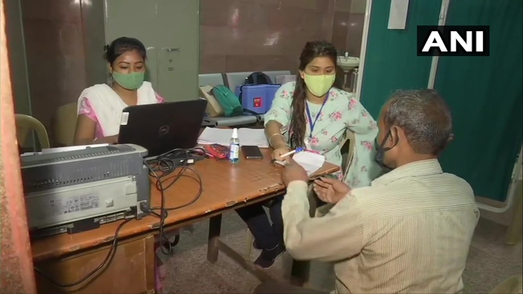 People arrive at a Covid-19 vaccination centre in Delhi on Sunday. (ANI Photo ) People arrive at a Covid-19 vaccination centre in Delhi on Sunday. (ANI Photo )