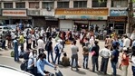 Covid-19: People in Indore stand in a queue to take "Remdesiver" injections at the wholesale market of medicine ' Dawa Bazar in Indore. (ANI) Covid-19: People in Indore stand in a queue to take "Remdesiver" injections at the wholesale market of medicine ' Dawa Bazar in Indore. (ANI)