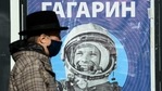 A man, wearing a face mask walks past a banner with an image of Soviet cosmonaut Yuri Gagarin in Moscow(AFP) A man, wearing a face mask walks past a banner with an image of Soviet cosmonaut Yuri Gagarin in Moscow(AFP)