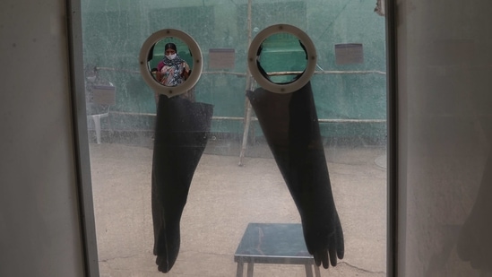 A woman waits for the result of her Covid-19 test at a hospital in Hyderabad, on April 12. India surpassed Brazil to record the second-highest number of Covid-19 cases at 1,35,27,717, after a record 1,68,912 new infections were reported on April 12, PTI reported.(Mahesh Kumar A / AP)