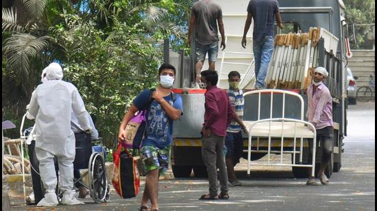 Extra beds for Covid-19 patients due to a spike in cases, at NESCO jumbo Covid-19 centre in Goregaon, Mumbai. (PTI) Extra beds for Covid-19 patients due to a spike in cases, at NESCO jumbo Covid-19 centre in Goregaon, Mumbai. (PTI)