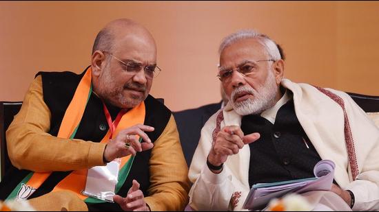 Prime Minister Narendra Modi (right) and BJP leader Amit Shah. (HT Archive)