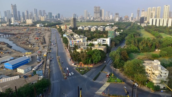 A deserted view of Lala Lajpatrai Rd and Keshavrao Khadye near Haji Ali Dargah, during the weekend lockdown imposed by the Government of Maharashtra, in Mumbai, on April 11. The US has the highest number of cases at 3,11,98,055 while globally 13,61,36,954 cases have been reported as of April 12, PTI reported.(Anshuman Poyrekar / HT Photo)