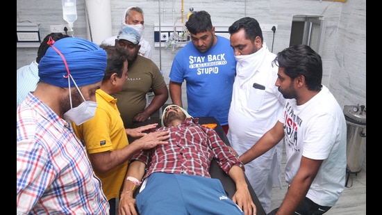 Gurdeep Singh, cousin of  gangster-turned-activist Lakha Sidhana, under treatment at the civil hospital at Bathinda on Sunday. (Sanjeev Kumar/HT)
