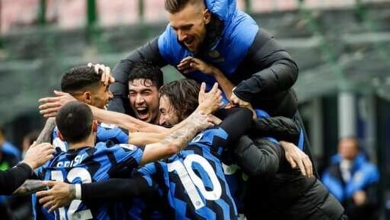 Inter Milan's Matteo Darmian, right, celebrates with teammates.(AP)