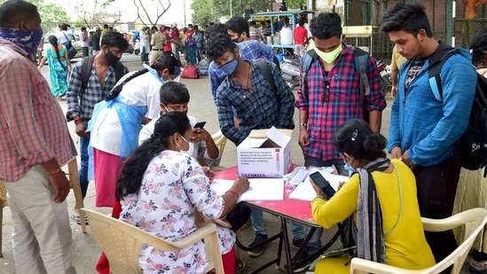 Bengaluru: Health workers register themselves for COVID-19 testing, amid the ongoing surge in coronavirus cases, at Bengaluru City Railway Station in Bengaluru, Monday, April 12, 2021. (PTI Photo/Shailendra Bhojak)(PTI04_12_2021_000057B) (PTI) Bengaluru: Health workers register themselves for COVID-19 testing, amid the ongoing surge in coronavirus cases, at Bengaluru City Railway Station in Bengaluru, Monday, April 12, 2021. (PTI Photo/Shailendra Bhojak)(PTI04_12_2021_000057B) (PTI)