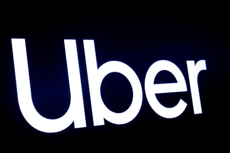 A screen displays the company logo for Uber Technologies Inc at the New York Stock Exchange. (Reuters file photo)
