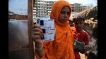 Rahima kato, a Rohingya woman displays identity cards of her family members issued by United Nations High Commissioner for Refugees (UNHCR) at their makeshift camp on the outskirts of Jammu, March 9,2021 (AP) Rahima kato, a Rohingya woman displays identity cards of her family members issued by United Nations High Commissioner for Refugees (UNHCR) at their makeshift camp on the outskirts of Jammu, March 9,2021 (AP)