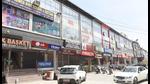 An otherwise busy market wearing a deserted look in Dhakoli on Tuesday. (Sant Arora/HT) An otherwise busy market wearing a deserted look in Dhakoli on Tuesday. (Sant Arora/HT)