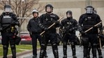 Minnesota Police officers stand guard outside the Brooklyn Center Police Station after a police officer shot and killed a Black man in Brooklyn Center, Minneapolis, Minnesota on April 12, 2021. (AFP) Minnesota Police officers stand guard outside the Brooklyn Center Police Station after a police officer shot and killed a Black man in Brooklyn Center, Minneapolis, Minnesota on April 12, 2021. (AFP)