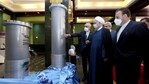 In this April 10, 2021, file photo released by the official website of the office of the Iranian presidency, Iranian President Hassan Rouhani, second from right, listens to the head of the Atomic Energy Organization of Iran Ali Akbar Salehi while visiting an exhibition of Iran's new nuclear achievements in Tehran, Iran. (AP)
