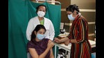 A nurse administering vaccine to a woman at PGIMS in Rohtak on Tuesday. (Manoj Dhaka/HT) A nurse administering vaccine to a woman at PGIMS in Rohtak on Tuesday. (Manoj Dhaka/HT)