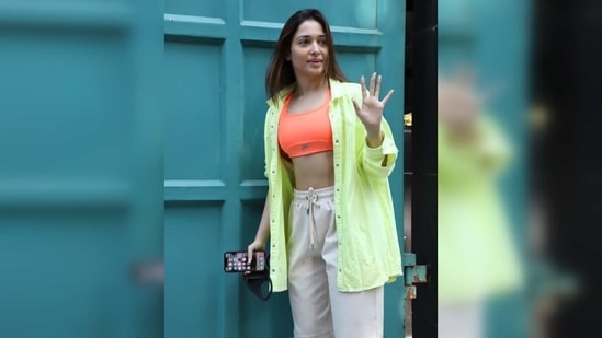 Tamannaah was even seen wearing a pastel green baggy unbuttoned T-shirt over her sports bra which she opted to style as a jacket.(Varinder Chawla)