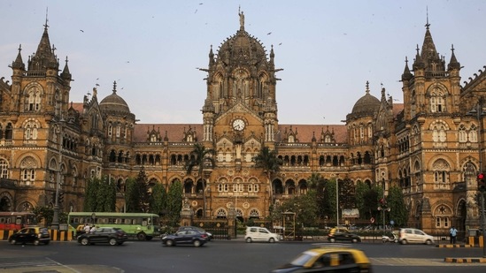 Vehicles travel past the Chhatrapati Shivaji Maharaj Terminus (CST) train station in during a weekend lockdown in Mumbai, India, on Saturday, April 10, 2021. (Bloomberg)