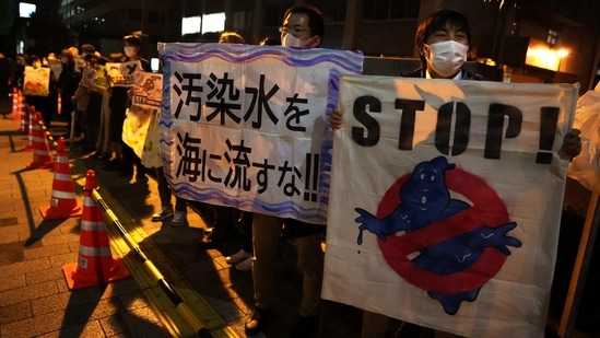 Japan decided on Tuesday to release treated radioactive water from crippled Fukushima No. 1 nuclear power plant into the sea. In picture - Protesters outside of the prime minister's office in Tokyo, Japan.(AFP)