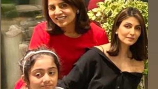 Neetu poses with her daughter and granddaughter.