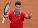 TOPSHOT - Serbia's Novak Djokovic celebrates after winning his second round singles match against Italy's Jannik Sinner on day five of the Monte-Carlo ATP Masters Series tournament in Monaco on April 14, 2021. (Photo by Valery HACHE / AFP)(AFP)