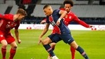 Bayern's Joshua Kimmich, left, Bayern's Leroy Sane, right, and PSG's Kylian Mbappe challenge for the ball during the Champions League, second leg, quarterfinal soccer match between Paris Saint Germain and Bayern Munich at the Parc des Princes stadium, in Paris, France, Tuesday, April 13, 2021. (AP Photo/Francois Mori)(AP) Bayern's Joshua Kimmich, left, Bayern's Leroy Sane, right, and PSG's Kylian Mbappe challenge for the ball during the Champions League, second leg, quarterfinal soccer match between Paris Saint Germain and Bayern Munich at the Parc des Princes stadium, in Paris, France, Tuesday, April 13, 2021. (AP Photo/Francois Mori)(AP)