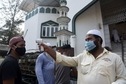A volunteer screens the temperature of people entering mosque to offer Friday prayers at Noor Masjid Vashi in Navi Mumbai in this file picture from 2020. (Bachchan Kumar/ HT PHOTO) A volunteer screens the temperature of people entering mosque to offer Friday prayers at Noor Masjid Vashi in Navi Mumbai in this file picture from 2020. (Bachchan Kumar/ HT PHOTO)