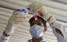 A health worker testing samples collected for Covid-19 testing at Sector 31 Polyclinic in Gurugram. (Vipin Kumar / Hindustan Times) A health worker testing samples collected for Covid-19 testing at Sector 31 Polyclinic in Gurugram. (Vipin Kumar / Hindustan Times)