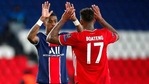 PSG's Presnel Kimpembe, left, and Bayern's Jerome Boateng at the end of the Champions League, second leg, quarterfinal soccer match between Paris Saint Germain and Bayern Munich at the Parc des Princes stadium, in Paris, France, Tuesday, April 13, 2021. (AP Photo/Francois Mori)(AP) PSG's Presnel Kimpembe, left, and Bayern's Jerome Boateng at the end of the Champions League, second leg, quarterfinal soccer match between Paris Saint Germain and Bayern Munich at the Parc des Princes stadium, in Paris, France, Tuesday, April 13, 2021. (AP Photo/Francois Mori)(AP)