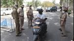Police restricting entry to Dhakoli, which was declared a containment zone by the Mohali administration. (Sant Arora/HT) Police restricting entry to Dhakoli, which was declared a containment zone by the Mohali administration. (Sant Arora/HT)