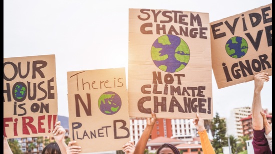 Group of demonstrators on road, young people from different culture and race fight for climate change - Global warming and enviroment concept - Focus on banners (Getty Images/iStockphoto) Group of demonstrators on road, young people from different culture and race fight for climate change - Global warming and enviroment concept - Focus on banners (Getty Images/iStockphoto)