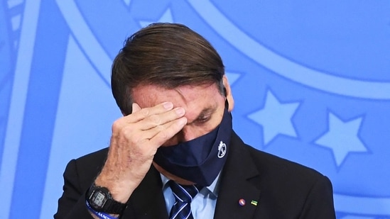 Bolsonaro has drawn widespread criticism for his approach to the coronavirus, which he has described as a "little flu." (AFP) Bolsonaro has drawn widespread criticism for his approach to the coronavirus, which he has described as a "little flu." (AFP)