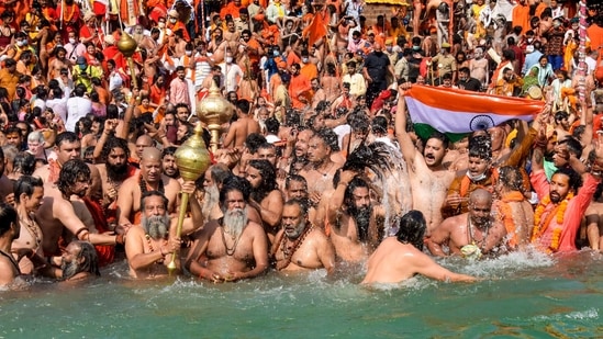 Devotees gather to offer prayers during the third 'Shahi Snan' of the Kumbh Mela, at Har ki Pauri Ghat in Haridwar, on Wednesday.(PTI Photo)