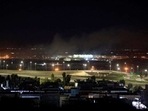 Smoke rises over the Erbil, after reports of mortar shells landing near Erbil airport, Iraq February 15, 2021.