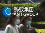 Employees are reflected on a glass panel while walking past a logo at the Ant Group Co. headquarters in Hangzhou, China. (Bloomberg) Employees are reflected on a glass panel while walking past a logo at the Ant Group Co. headquarters in Hangzhou, China. (Bloomberg)