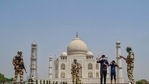 CISF personnel urge tourist to wear mask, at Taj Mahal in this file photo from April 13, 2021. (PTI Photo) CISF personnel urge tourist to wear mask, at Taj Mahal in this file photo from April 13, 2021. (PTI Photo)