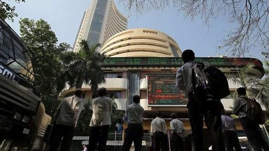 People look at a screen displaying the Sensex results on the facade of the Bombay Stock Exchange (BSE) building in Mumbai, December 11, 2018. REUTERS/Francis Mascarenhas/Files (REUTERS)