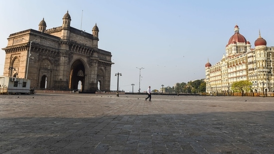 Gateway of India wears a deserted look following restrictions imposed by the state government, amidst rising Covid-19 cases, in Mumbai on April 15. New Delhi and several of other cities and towns have already imposed night curfews as they battle surging infections.(Kunal Patil / PTI)