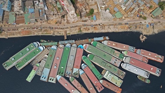 In this aerial photo boats are seen parked on the banks of the Buriganga River during a lockdown imposed to combat the spread of the Covid-19 coronavirus, in Dhaka on April 15, 2021. (Photo by Munir UZ ZAMAN / AFP) (AFP) In this aerial photo boats are seen parked on the banks of the Buriganga River during a lockdown imposed to combat the spread of the Covid-19 coronavirus, in Dhaka on April 15, 2021. (Photo by Munir UZ ZAMAN / AFP) (AFP)
