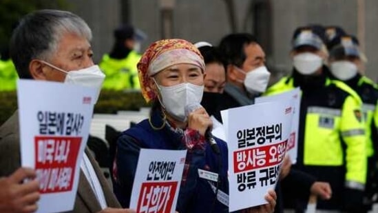 After a wave of criticism on social media and in parliament, the Reconstruction Agency said it would temporarily retire and redesign the character. In picture - Protesters denounce the Japanese government's decision on Fukushima water in front of a building which houses Japanese embassy in Seoul, South Korea. (AP) After a wave of criticism on social media and in parliament, the Reconstruction Agency said it would temporarily retire and redesign the character. In picture - Protesters denounce the Japanese government's decision on Fukushima water in front of a building which houses Japanese embassy in Seoul, South Korea. (AP)