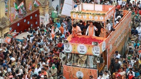Union home minister Amit Shah holding a road show in West Bengal. (PTI PHOTO.)
