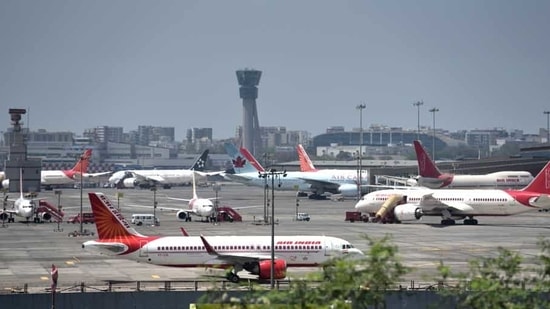 Planes are seen parked at Mumbai airport. All flight operations, both international and domestic, will be conducted through the Terminal 2 starting next Wednesday, authorities have informed.(Satish Bate / HT Photo)