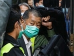 Media tycoon Jimmy Lai, the founder of Apple Daily, leaves the Court of Final Appeal by prison van, in Hong Kong.