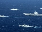 Chinese Navy formation during military drills in the South China Sea. Chinese Navy formation during military drills in the South China Sea.