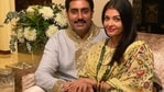 Abhishek Bachchan and Aishwarya Rai Bachchan pose together.