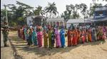 Voters stand in queues to cast their votes during West Bengal Assembly polls. (PTI)